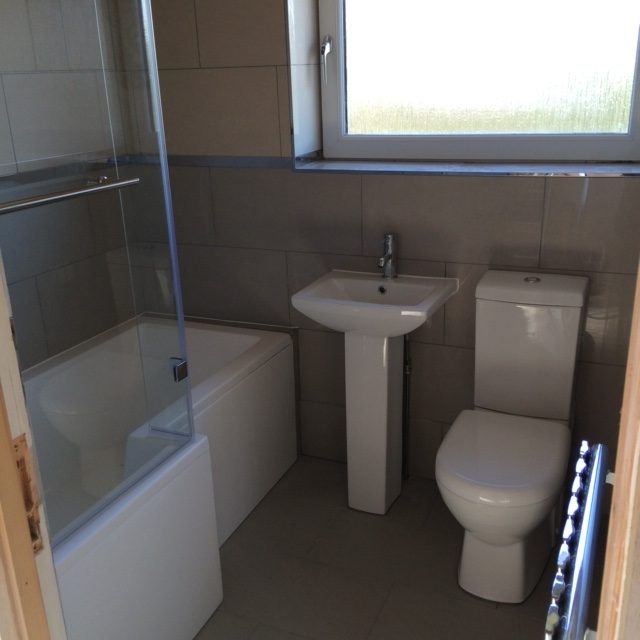 Full-width shot of a bathroom job by JR40 Plastering in Northampton