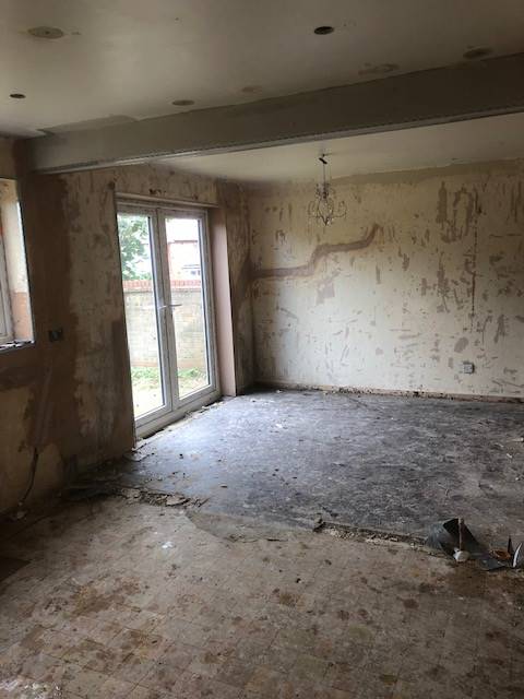 image of a stripped room before new plastering
